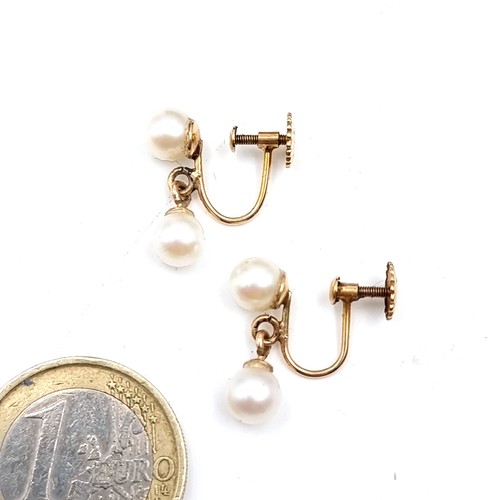 548 - A very pretty pair of fine pair of 9 carat gold screw clasp double set snowdrop pearl earrings, with... 