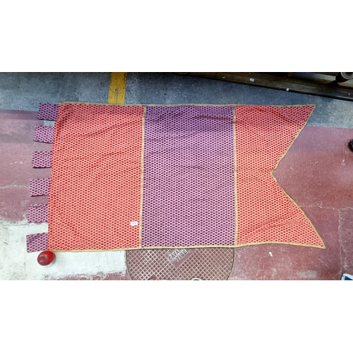 578 - A large and long heraldic banner finished with featuring a tactile red and purple design. Great for ... 