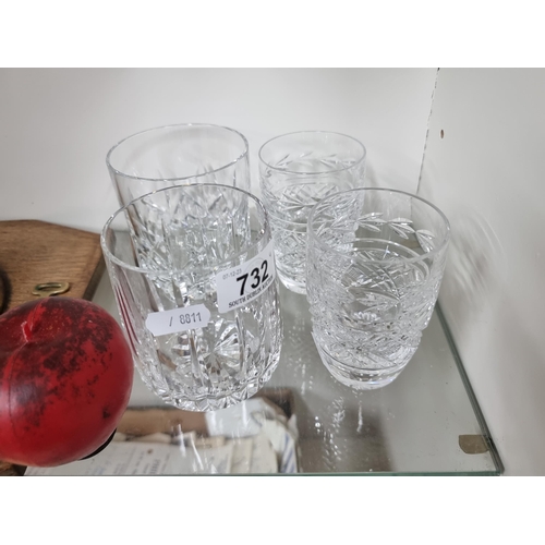 732 - Four crystal items including two Waterford crystal whiskey tumbler glasses.