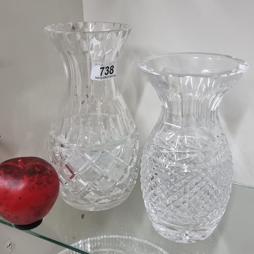 738 - Two elegant cut crystal vases including a Waterford and Galway Crystal example.