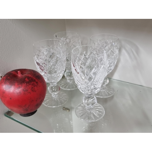 740 - A set of four Waterford Crystal stemmed glasses. All in good condition, retaining acid mark to base.