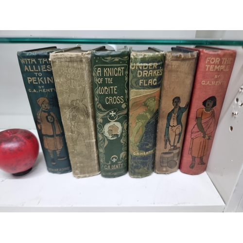 750 - A collection of six vintage hardback G.A. Henry books including titles such as 