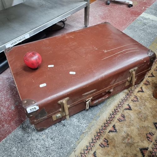 775 - A fabulous Mid Century Headline Luggage leather travel suitcase. With brass hardware, brown finish a... 