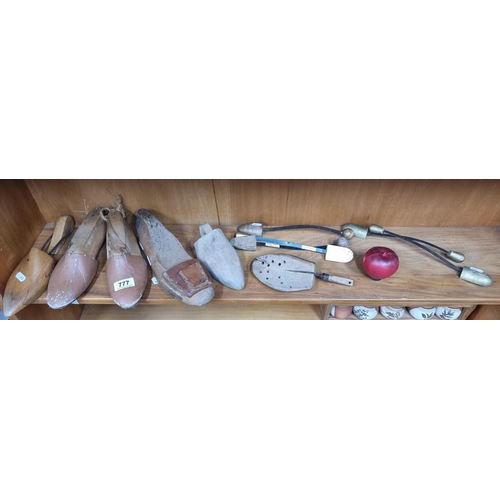 777 - A selection of 11 vintage wooden shoe stays and stretchers.