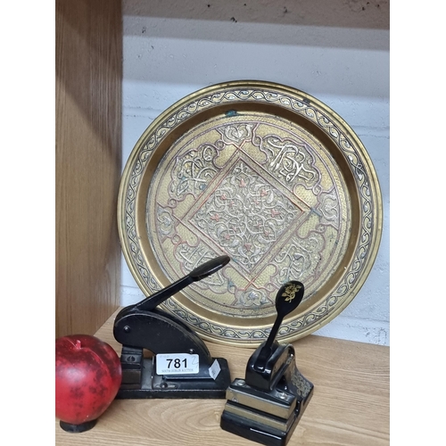 781 - Three items, including two vintage cast metal embossers, one featuring a lovely foliate design. Both... 