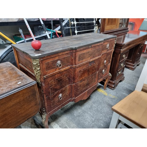 700 - Star Lot: A fabulous French antique style credenza, with bow front, parquetry detail, ormolu figure ... 