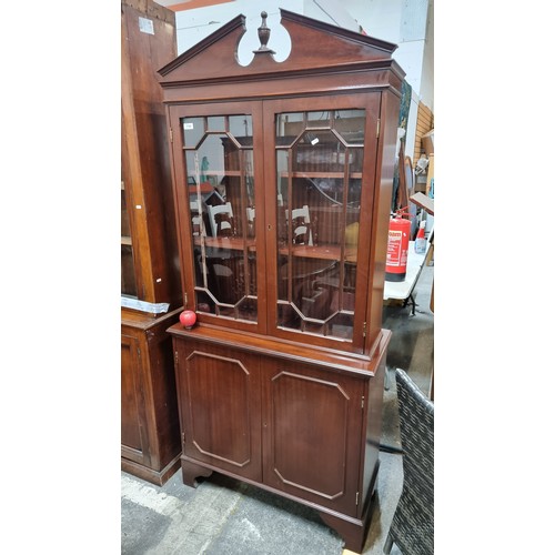 710 - A fabulous late Victorian astral glazed two door bookcase on ornate carved panel cupboard base. Grea... 