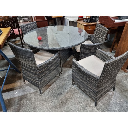 721 - Star Lot : A superb 5 piece rattan glass top garden patio dining table along with four high quality ... 