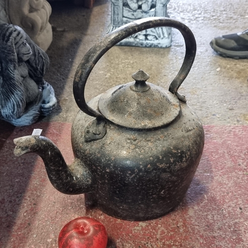 818 - A stunning 19th century  very large cast iron Irish kettle. Might have been around at the time of th... 