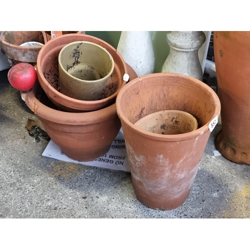 852 - Five planters including terracotta examples. These large Terracotta pots are amazing from a huge est... 