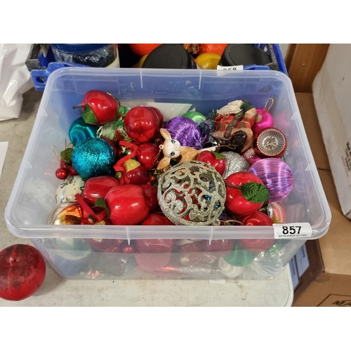 857 - A crate containing a large number and variety of Christmas tree decorations including baubles, Santa... 