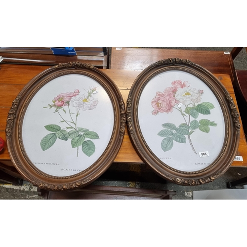 868 - A pair of beautiful highly ornate oval wooden picture frames.