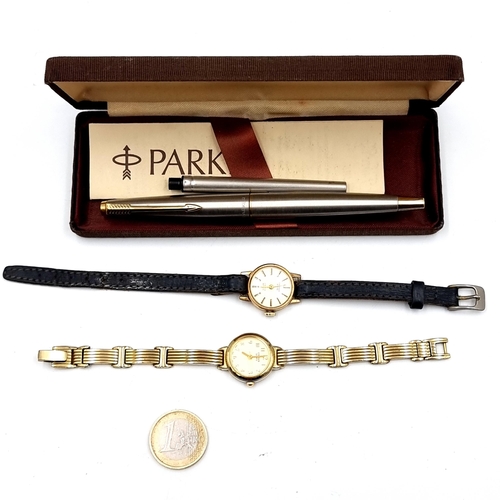 Three items including two lady watches from Citizen and Oriosa along with an elegant Parker fountain pen held in original box.