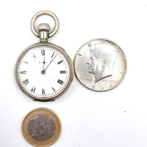 910 - Two items including a 1964 90%  silver USA half dollar coin and  a vintage Elgin pocket watch.