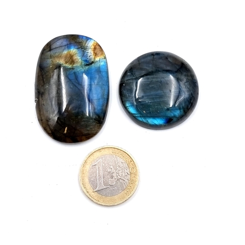 935 - Two stunning labradorite cabochon stones, weighing 18.24 grams and 14.86 grams.