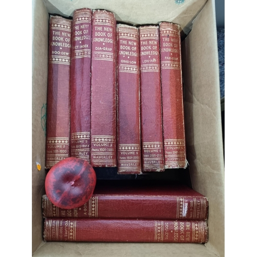 943 - A box containing eight hardback books titled 