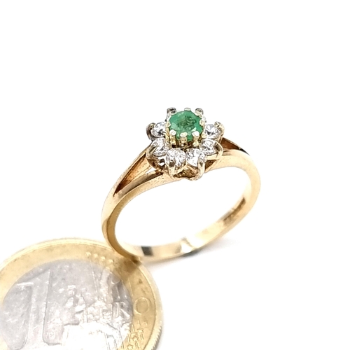 951 - Star lot : A 9K gold ring with a raised mount featuring an emerald with a gem set floral cluster, ri... 