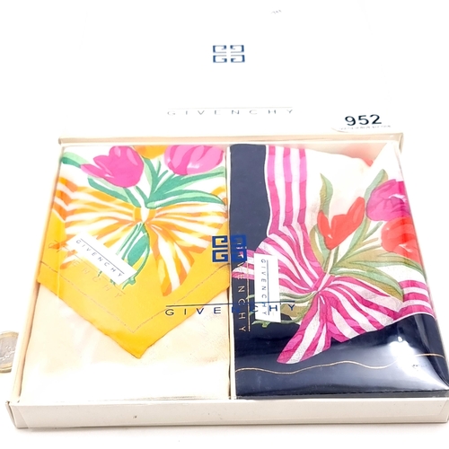 952 - A beautiful boxed collection of two designer floral squares by Givenchy dimensions 54cm square. New ... 