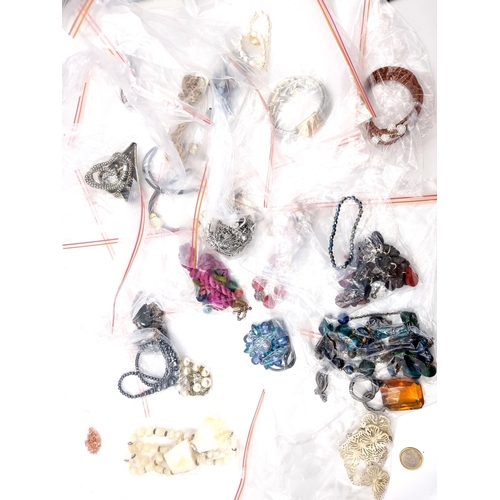 953 - A large collection of 22 pieces of costume jewellery including colourful beaded and chain necklaces ... 