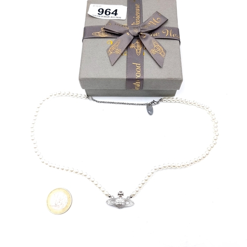 964 - A stunning pearl necklace by Vivienne Westwood featuring a gem set emblem pendant with presentation ... 