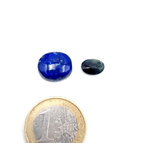 966 - a collection of two gem stones including a 7.7 cts oval cabochon natural lapis lazuli along with a 1... 