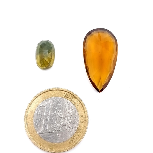 969 - two gem stones including a 12.18 cts pear mixed cut natural citrine along with a 4.27 cts oval mixed... 