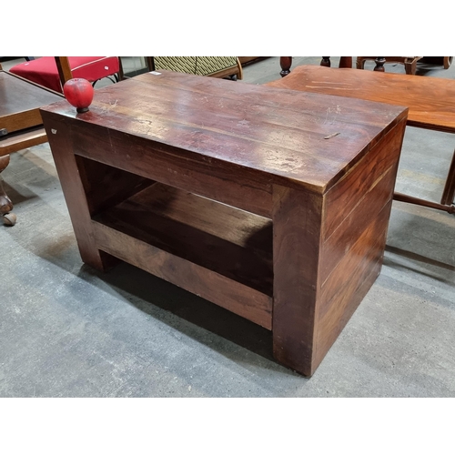 993 - A robust hard wood coffee table, With lovely detail of the grain and shelf below for shoes or period... 