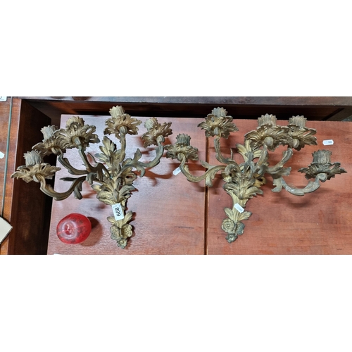 668 - Two gorgeous antique French  brass wall candle sconces featuring five branches each, boasting organi... 