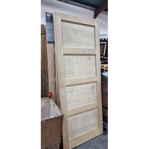 691 - Three heavy quality Fergus Interior doors featuring four panels and a hardwood finish. Two brand new... 