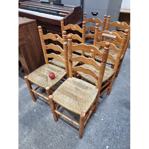 Star Lot : A set of six charming ladder back dining chairs with sugán style seats and turned supports.