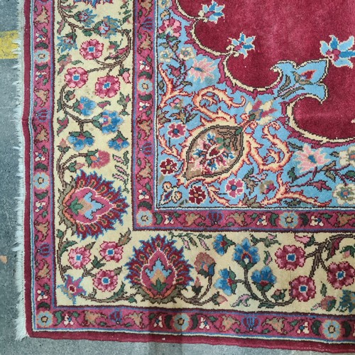 971 - Star Lot :  A very large striking beautiful  hand knotted woolen rug boasting a floral design in sha... 