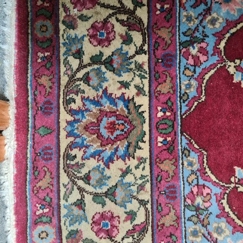 971 - Star Lot :  A very large striking beautiful  hand knotted woolen rug boasting a floral design in sha... 