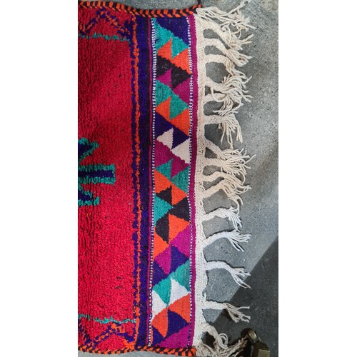 972 - Star Lot : A vibrant hand knotted Aztec style hall runner rug in shades of red, blue, orange, purple... 