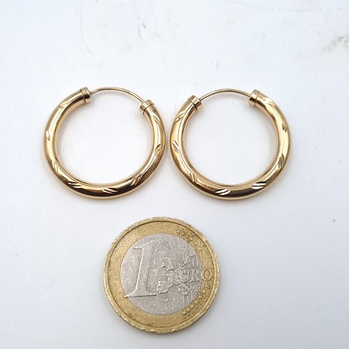 882 - A pair of gorgeous 9K gold hoop earrings suitable for pierced earrings.