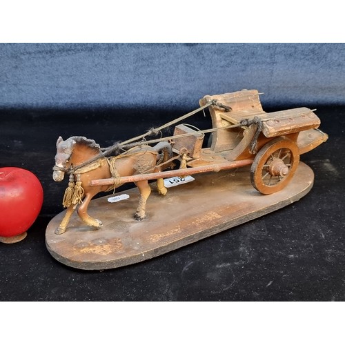 251 - A delightful vintage wooden model of a horse and cart.