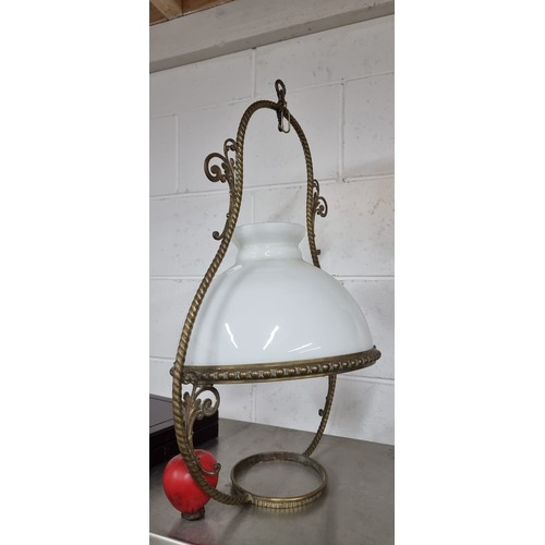 760 - An elegant vintageceiling pendant light with a brass rope twist frame boasting scroll detailing. Wit... 