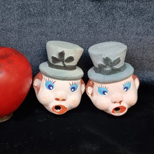 270 - Two charming vintage collectible Irish chalkware faces with a shamrock on their hats.