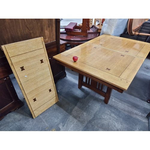 708 - Star lot: A fabulous large antique inlaid golden oak dining table with extendable leaf. Beautifully ... 