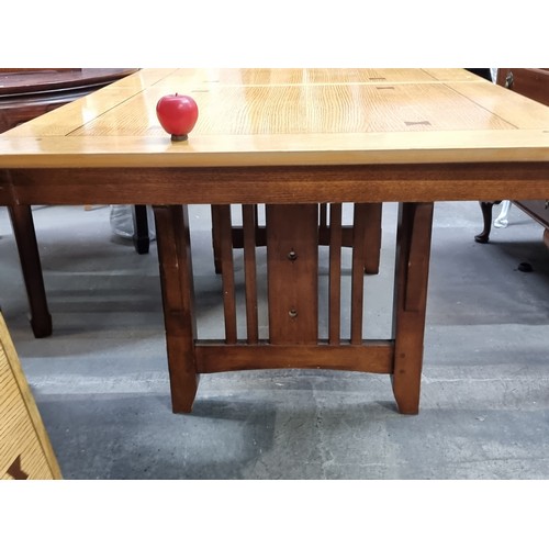 708 - Star lot: A fabulous large antique inlaid golden oak dining table with extendable leaf. Beautifully ... 