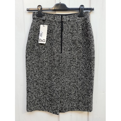 231 - Star Lot - A fabulous brand new with tags ladies Dolce & Gabbana herringbone tweed midi pencil skirt... 