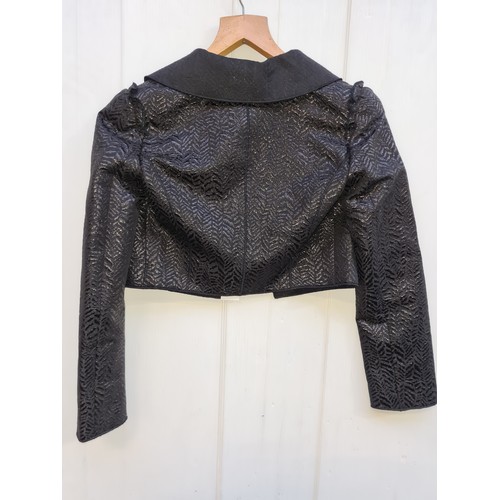 233 - Star Lot - A brand new with tag ladies Dolce & Gabbana short jacket, boasting black wool blend broca... 