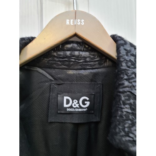 239 - Star Lot - A gorgeous brand new with tags ladies Dolce & Gabbana classic style coat. Featuring a fab... 