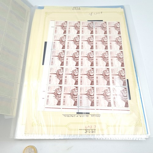 922 - A lovely collection twenty pages of full Irish sheets and blocks together other Germanic stamps and ... 