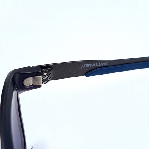 503 - A pair of Oakley metal link sunglasses, metal link marked to frame, lenses in clean condition