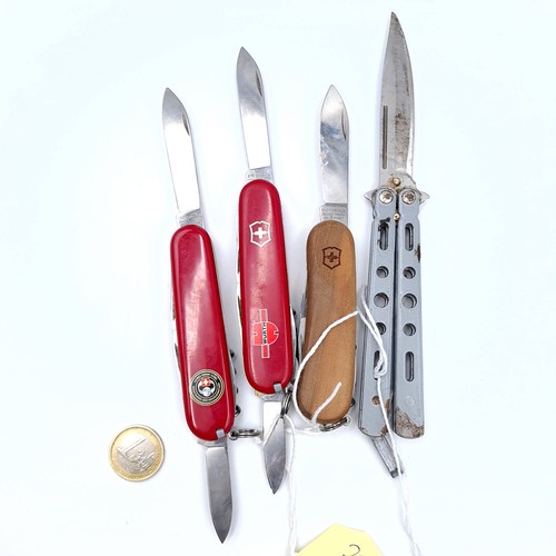 505 - A collection of 4 knives consisting of  three genuine Swiss army knives including of one specially m... 