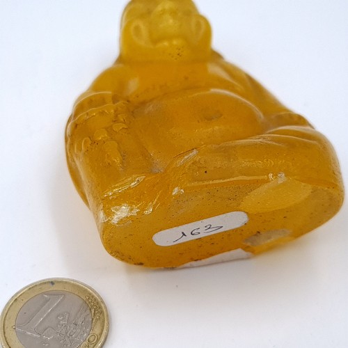 536 - A vintage carved soapstone happy Buddha figure. Dimensions - 9cm x 6cm. Weight 337grams.