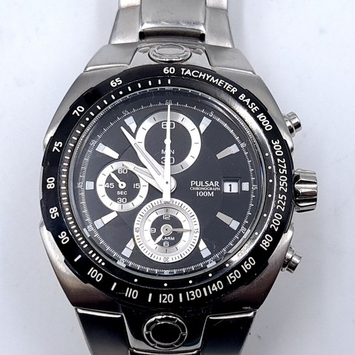 544 - A Pulsar chronograph watch, water resistant to 100m, set with luminous baton dial and luminous hands... 