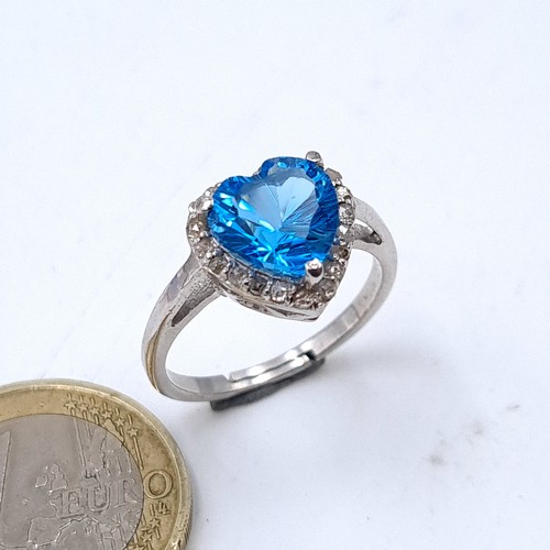 546 - Star Lot : A really beautiful blue topaz heart shaped ring with diamond surround, topaz 8.75 cts, di... 