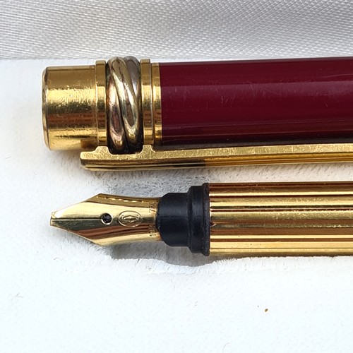 Star Lot A must de Cartier Paris trinity fountain pen set with a