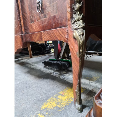 700 - Star Lot: A fabulous French antique style credenza, with bow front, parquetry detail, ormolu figure ... 